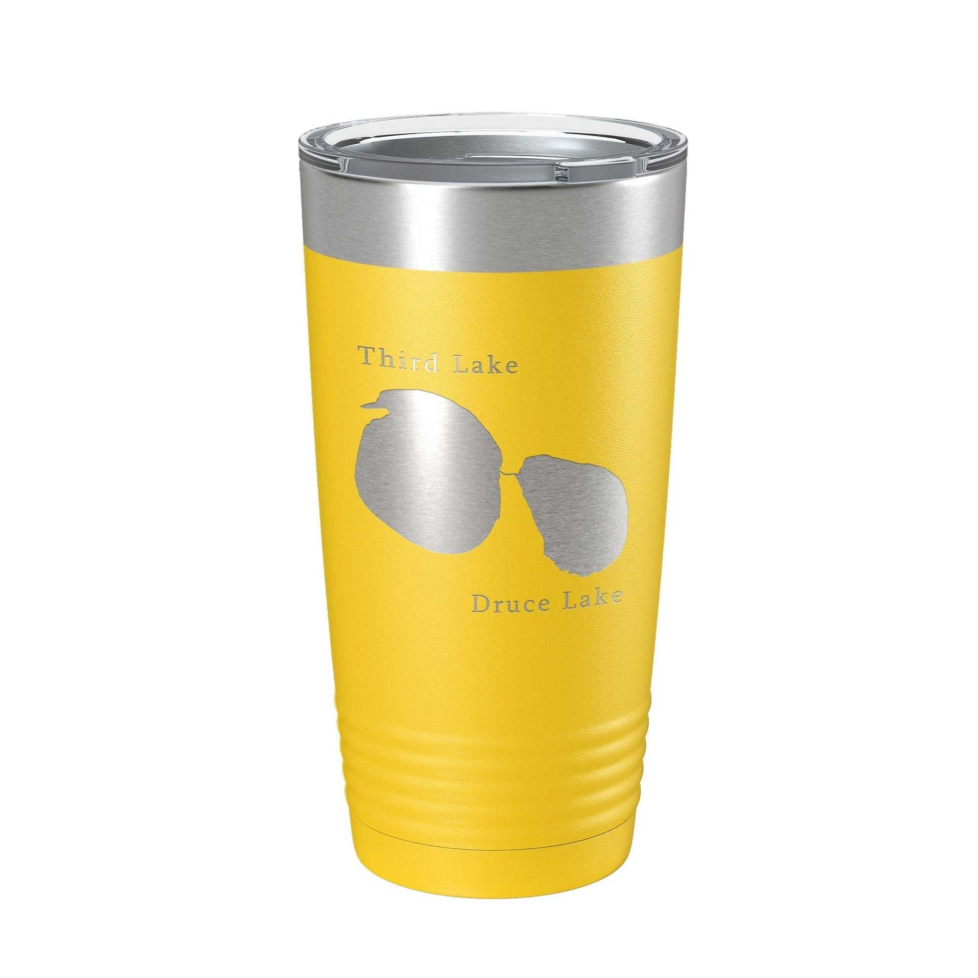 Yellow 20 oz insulated travel tumbler with laser-etched Third and Druce Lakes map design and clear lid.