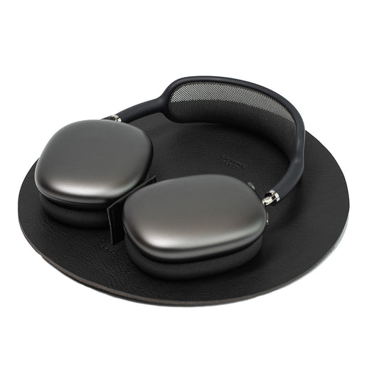 AirPods Max Rest Station in black leather cradle for headphone storage and low power mode activation